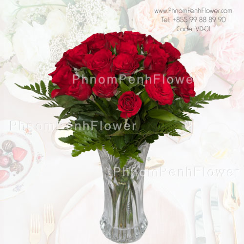 2 Dozen red roses in glass vase