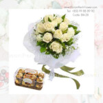 A Dozen white roses bouquet with Chocolate