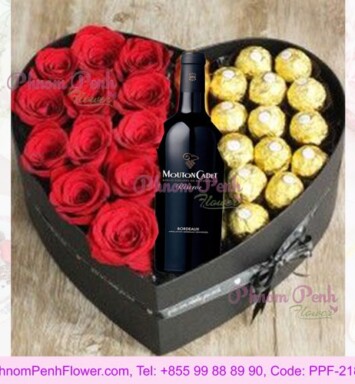 Heart shape of wine, rose & chocolate