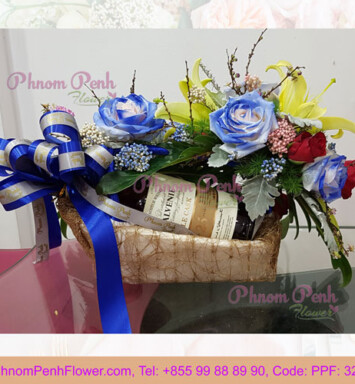 Red Wine in basket with flower