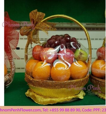 Tropical fruits basket arrangement