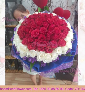 Beautiful bouquet of 99 white & red roses