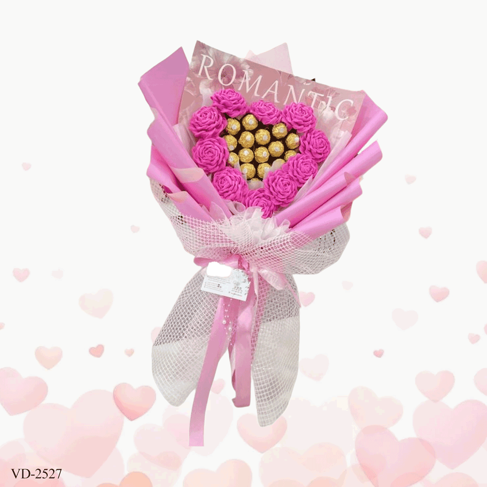 Pink paper flower bouquet with chocolate